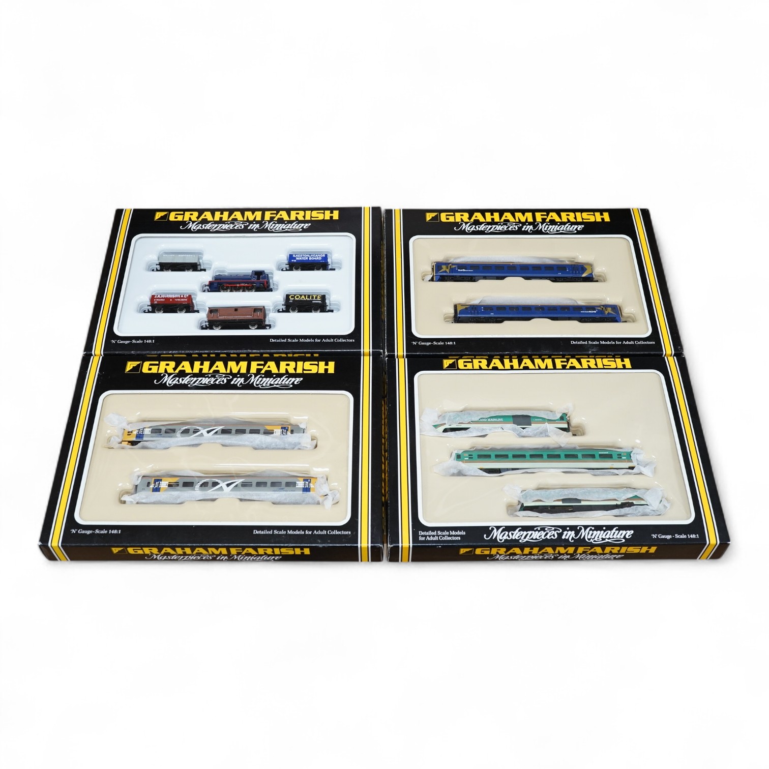 Four boxed Graham Farish N gauge railway train packs; a Midland Mainline HST 125 train (371475), a Wales and West 2-car DMU (371552), a First Northwestern 2-car DMU (371551) and a National Coal Board Class 94 locomotive